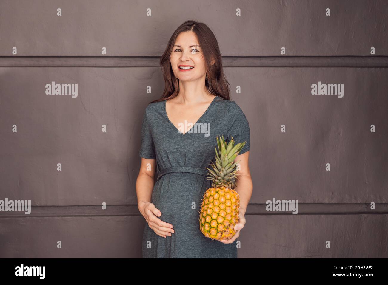 A pregnant woman's belly, beautifully showcasing the size of her baby
