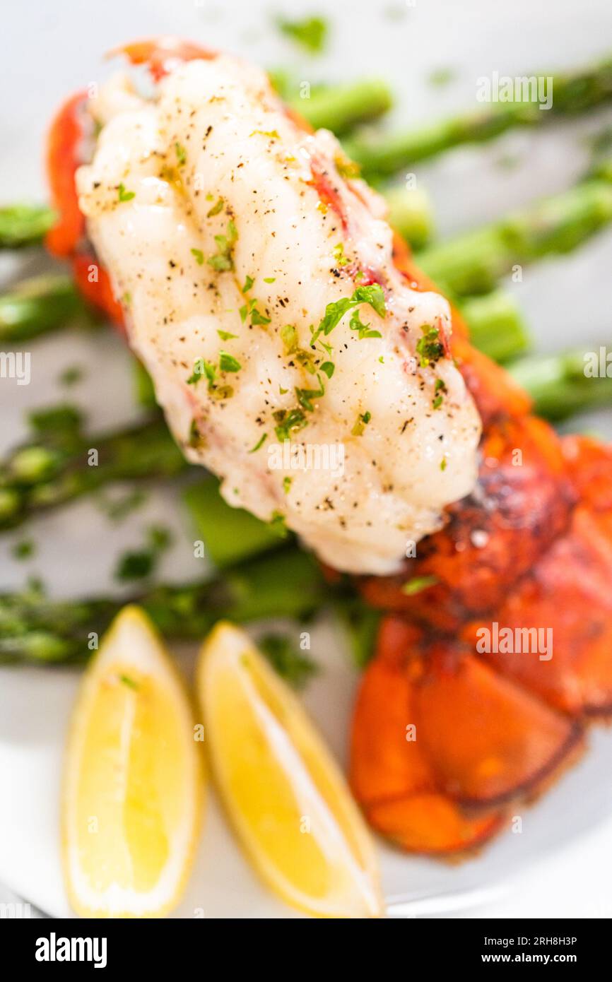 Garlic lobster tails Stock Photo Alamy