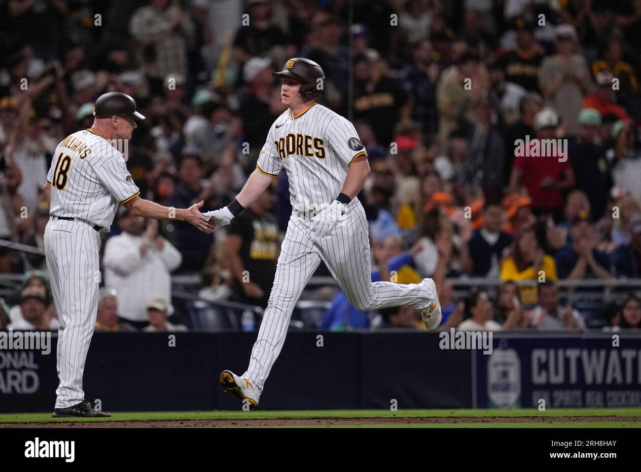 San Diego Padres' Garrett Cooper, right, celebrates with third base coach Matt  Williams after hitting a home run during the sixth inning of a baseball  game against the Baltimore Orioles, Monday, Aug.