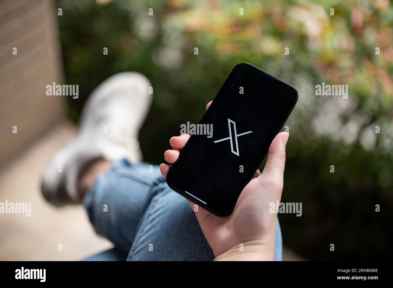 Chiang Mai, Thailand Aug 14 2023 A female using X new twitter