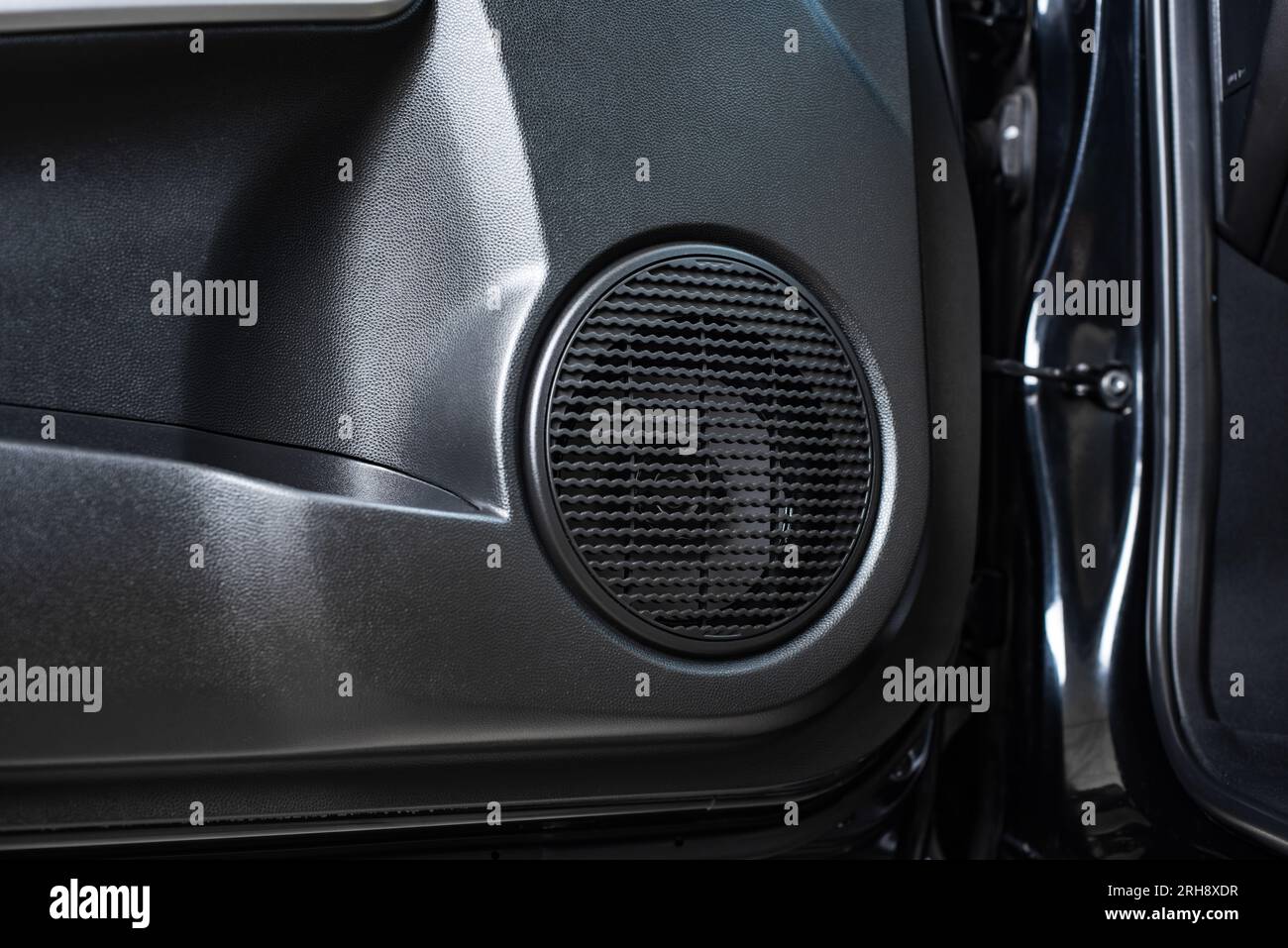 Close up car speaker on car door panel. Car audio system concept Stock