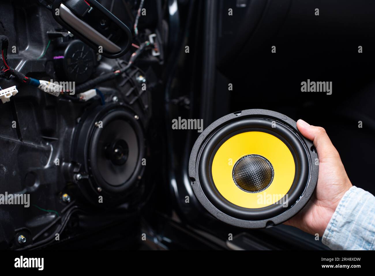 The black audio loudspeaker with yellow diaphragm. Car audio installation  concept Stock Photo - Alamy