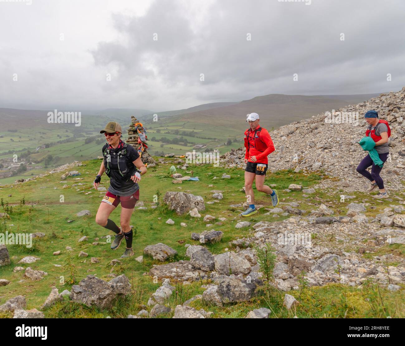 Runners in a race on the hills above Reeth in North Yorkshire. Stock Photo
