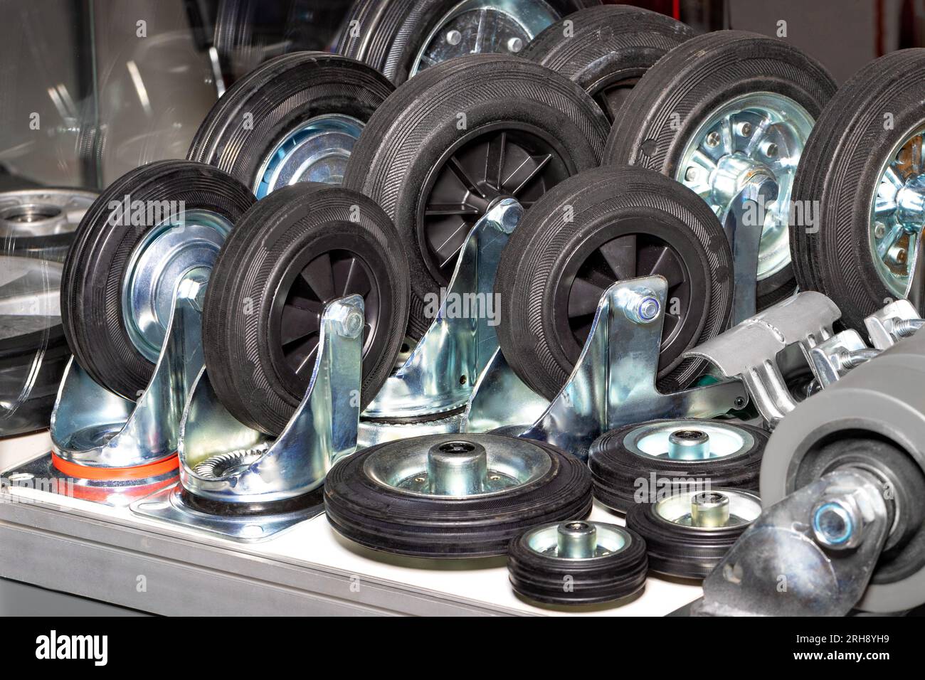 Group of industrial wheels in different sizes in black for use in heavy