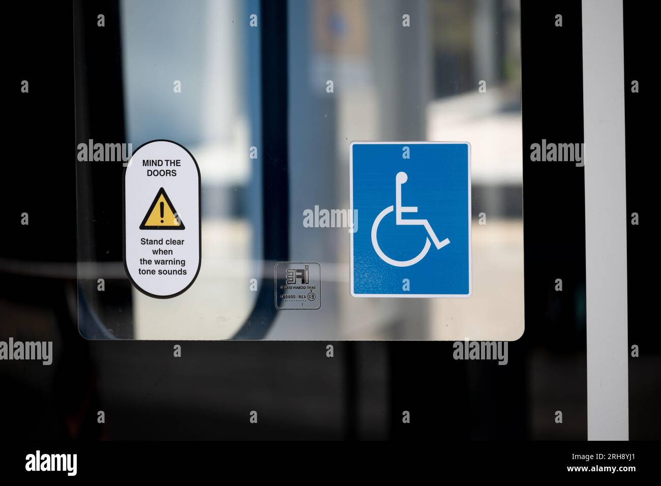 Wheelchair sign on a West Midlands Metro tram, Birmingham, UK Stock Photo