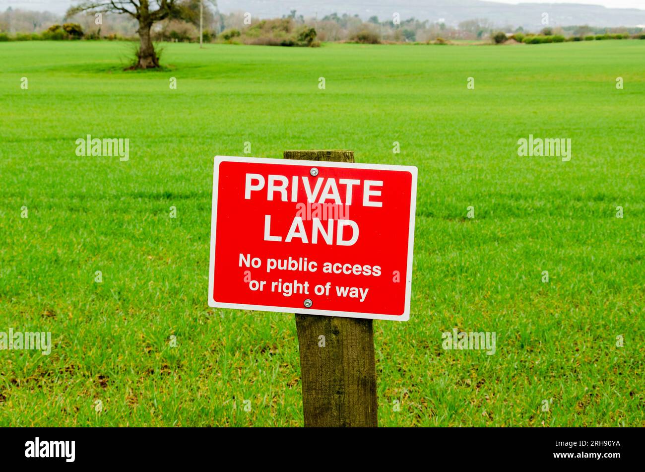 Private, No public access or right of way, sign on a wooden post Stock