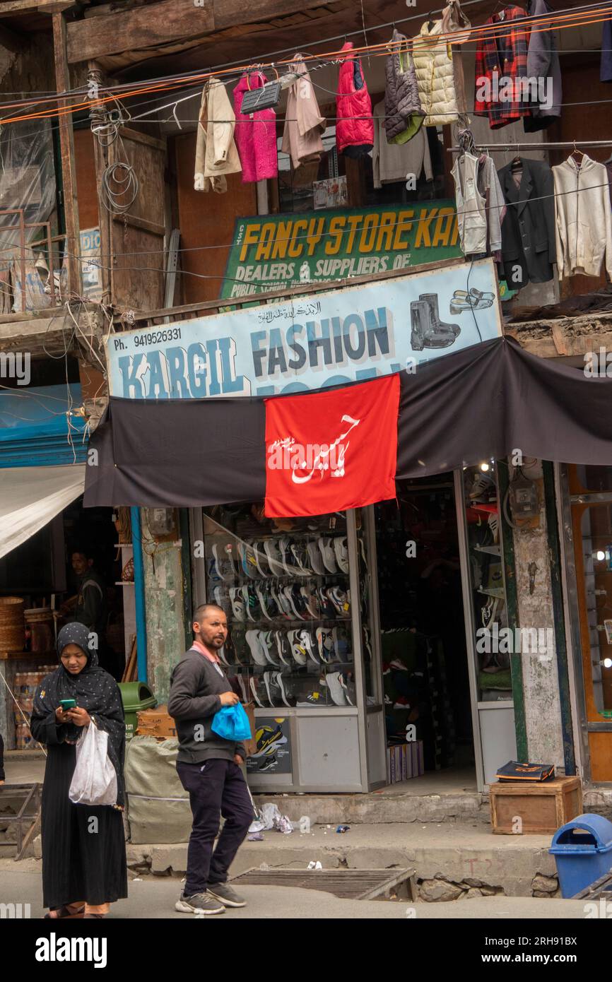 India, Jammu & Kashmir, Kargil old bazaar, shoe and fashion shop in historic building Stock Photo