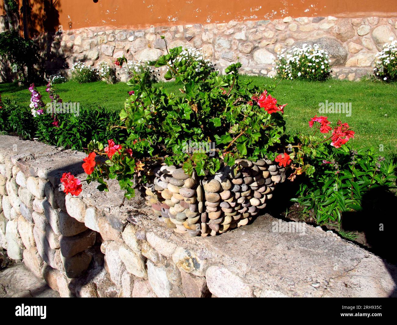 Flowers in Indian house in Andes, Peru Stock Photo Alamy