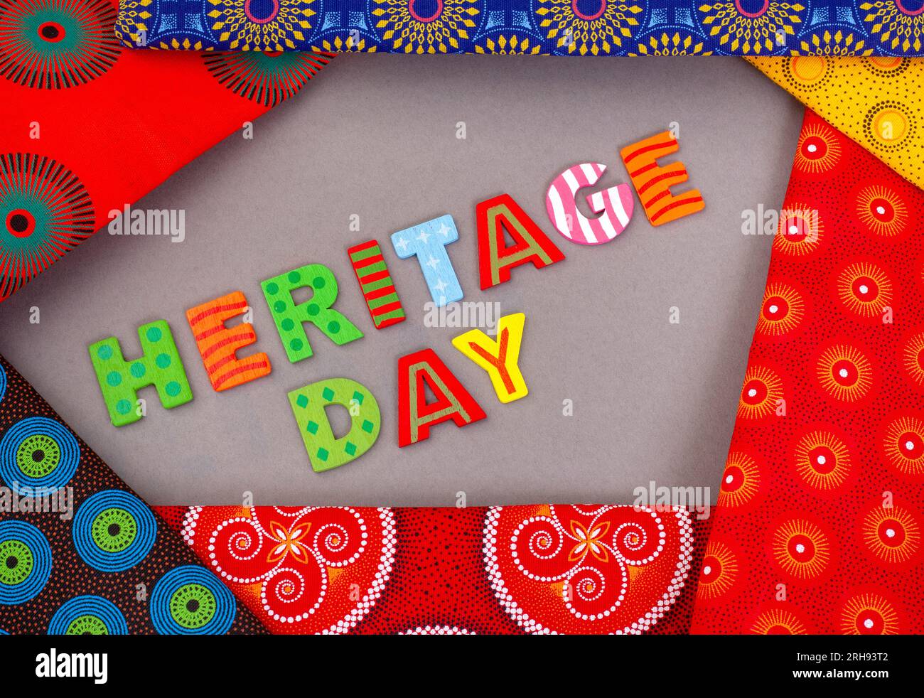 Heritage Day South Africa, 24th September. Heritage Day written in colorful letters with iconic South African printed cloth Stock Photo