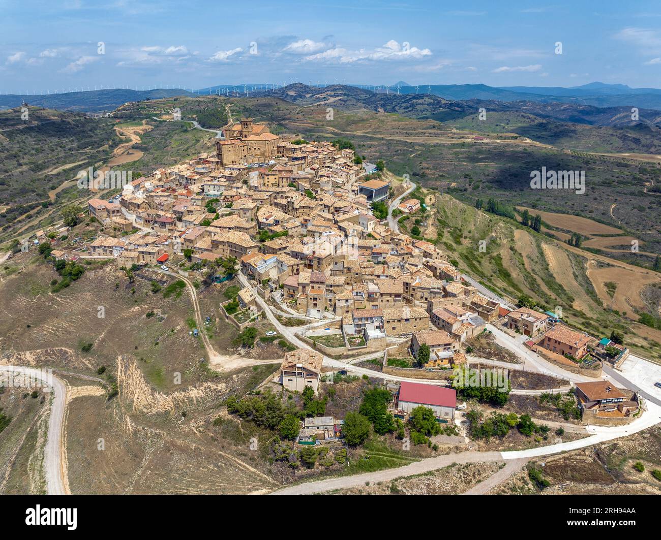 Aerial view of the hilltop medieval village of Ujue in Navarra, northern Spain on ancient pilgrim route Camino de Santiago or Way of St James. Nominat Stock Photo