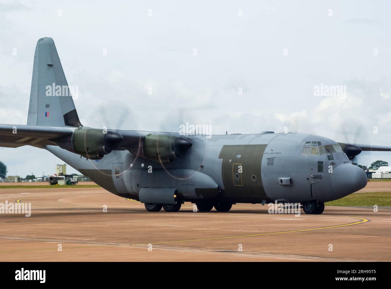 Royal Air Force Lockheed Martin C-130J Hercules C5 transport plane ZH889 taxiing out to take off at RAF Fairford. Patchwork panels Stock Photo