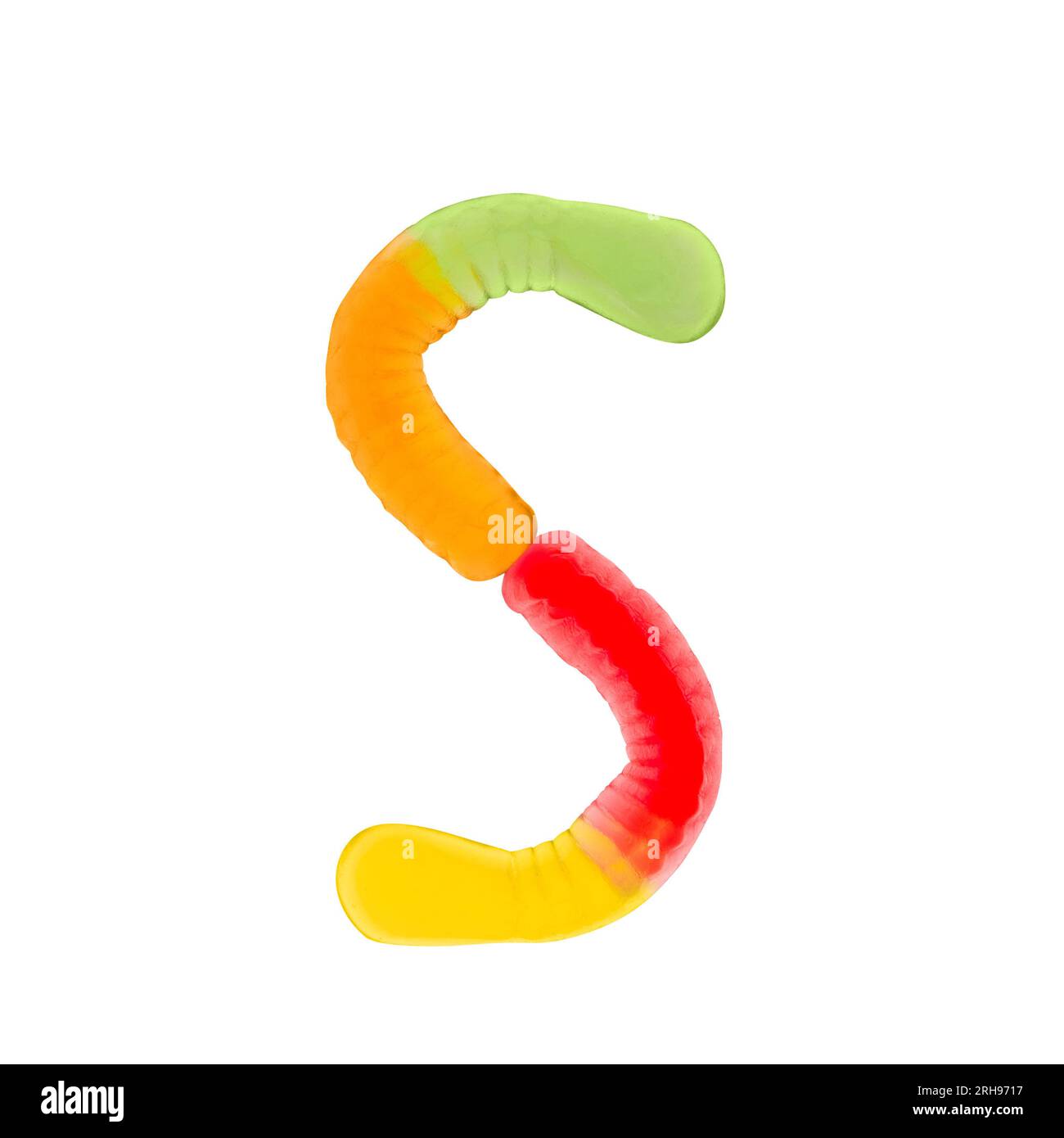 Letter S made of multicolored gummi worms and isolated on pure white background. Food alphabet concept. One letter of the set of sweet food font easy Stock Photo
