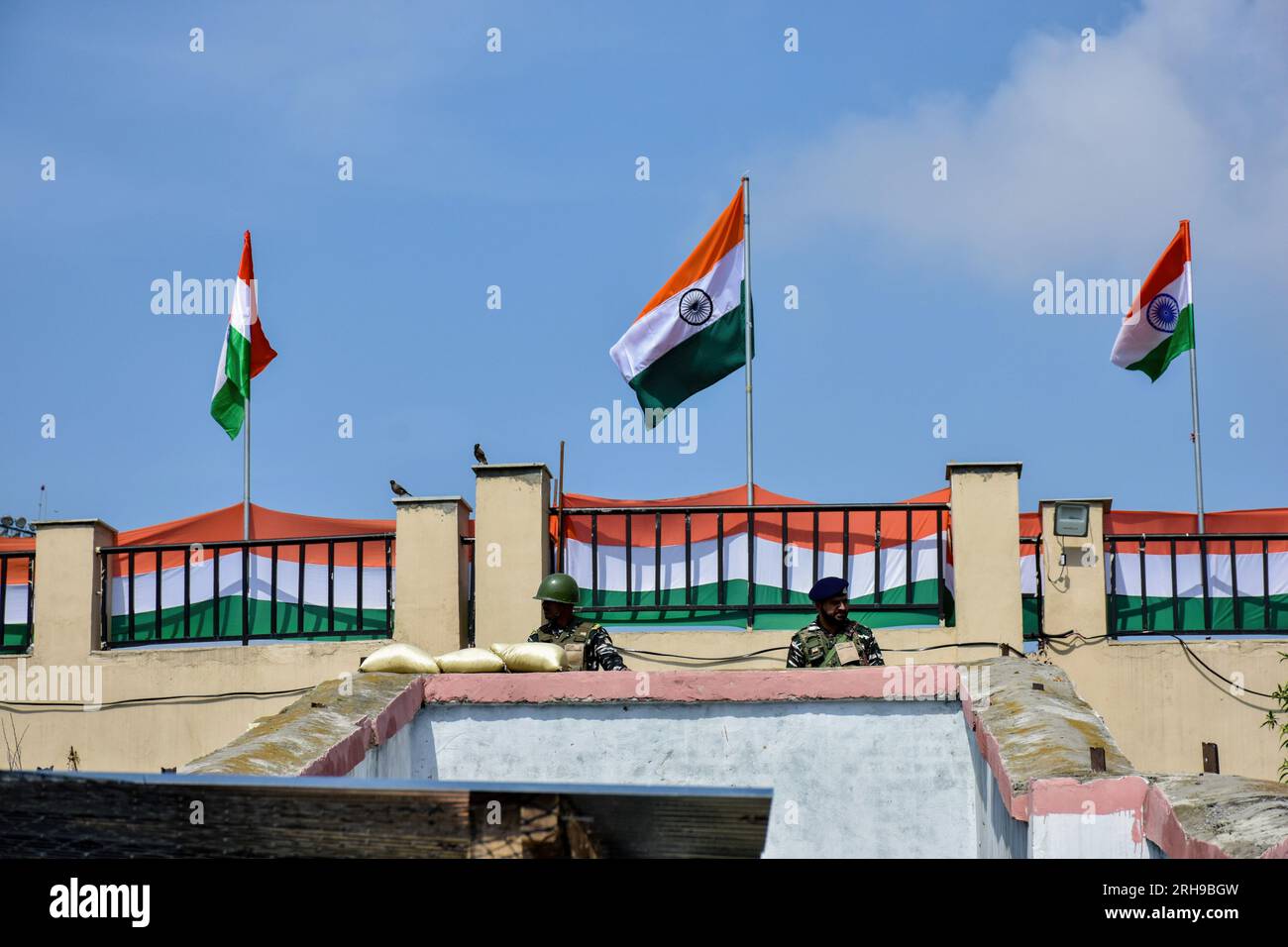 Paramilitary troopers keep vigil during the India's 77th Independence Day in Srinagar. Stock Photo