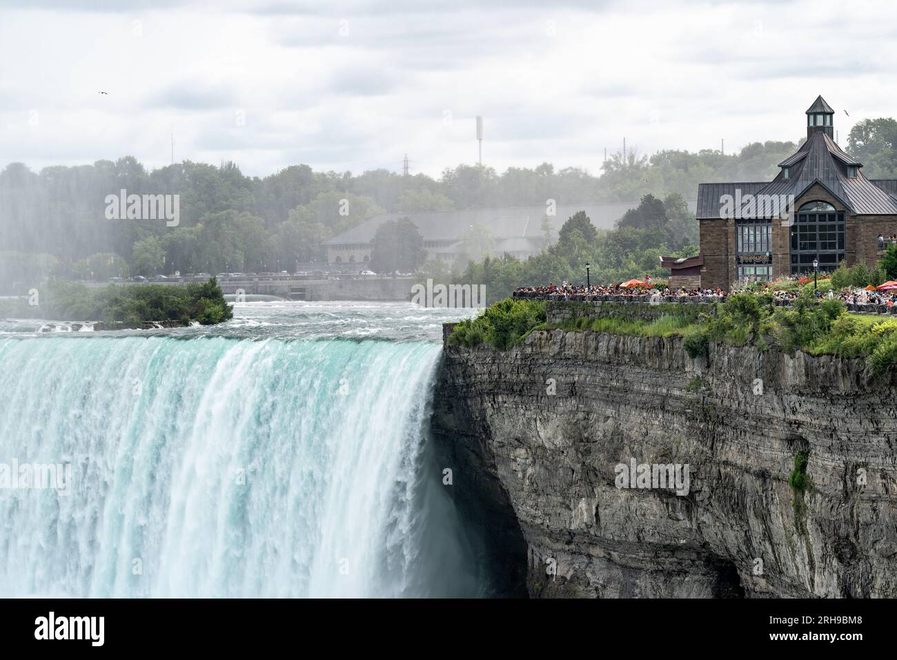 scenes from around Niagra Falls, taken from the Canadian side and focusing on the drama of the water falls and a dark brooding sky Stock Photo