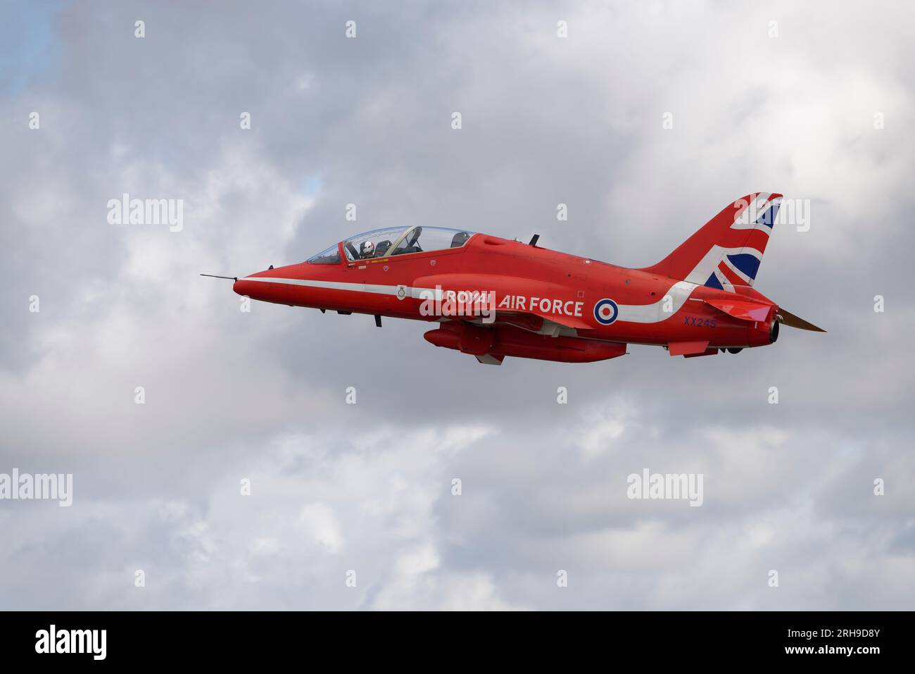 XX245 a British Aerospace Hawk T.1 Jet Trainer aircraft of the Royal Air Force Red Arrows Aerobatic Display Team departs RAF Fairford  after the RIAT Stock Photo