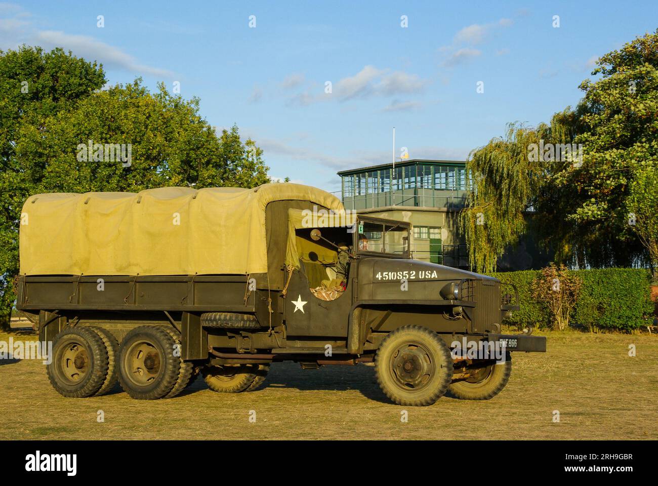 Second World War American military Studebaker 2½-ton 6×6 truck on show at Rougham Airfield at sunset. Former USAAF airbase Stock Photo