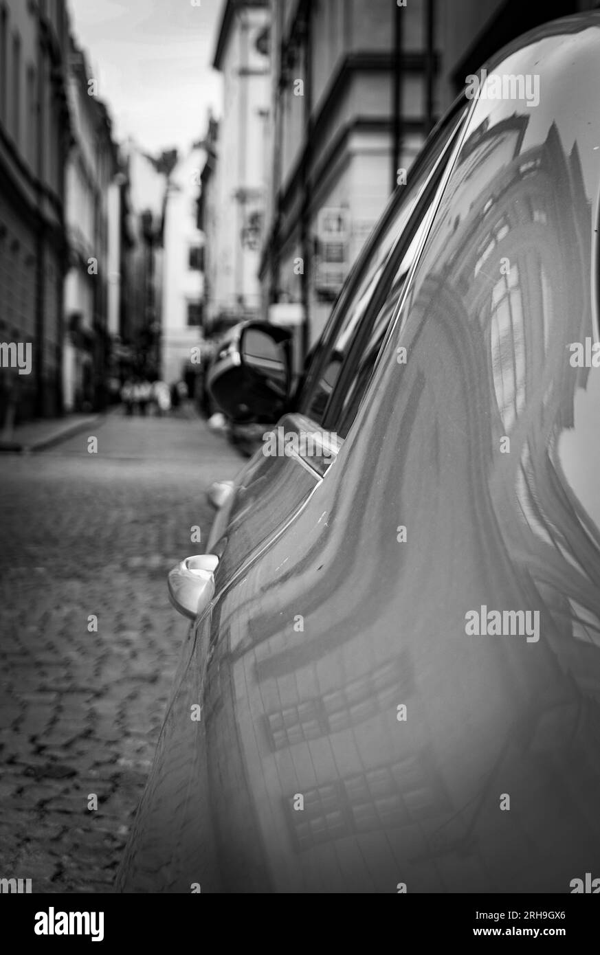 Close of a side of a car parked in the city Stock Photo