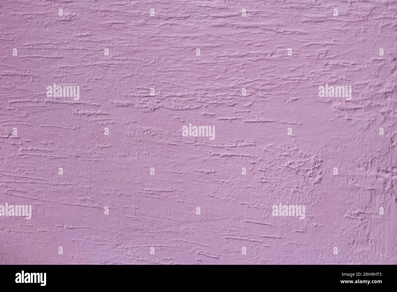 Abstract pink stucco grunge textured background. Wall is finished with decorative cement plaster. Facing. Copy space Stock Photo