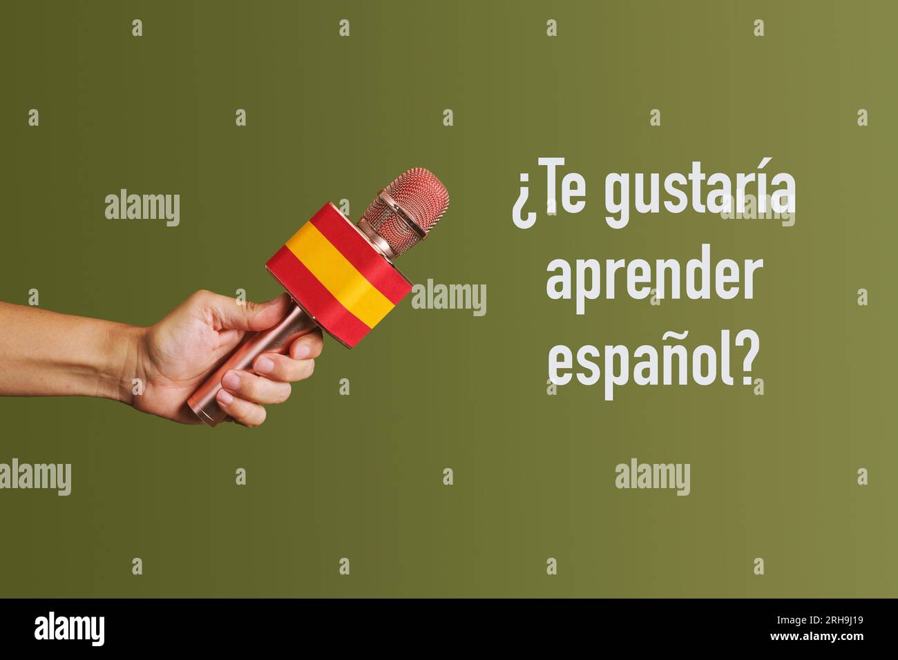 man holding a microphone patterned with the flag of spain and the