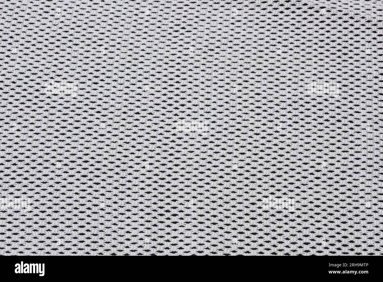 fabric texture. mesh texture. flower fabric texture. string texture, mesh cloth. black synthetic fabric. can be used as a background Stock Photo