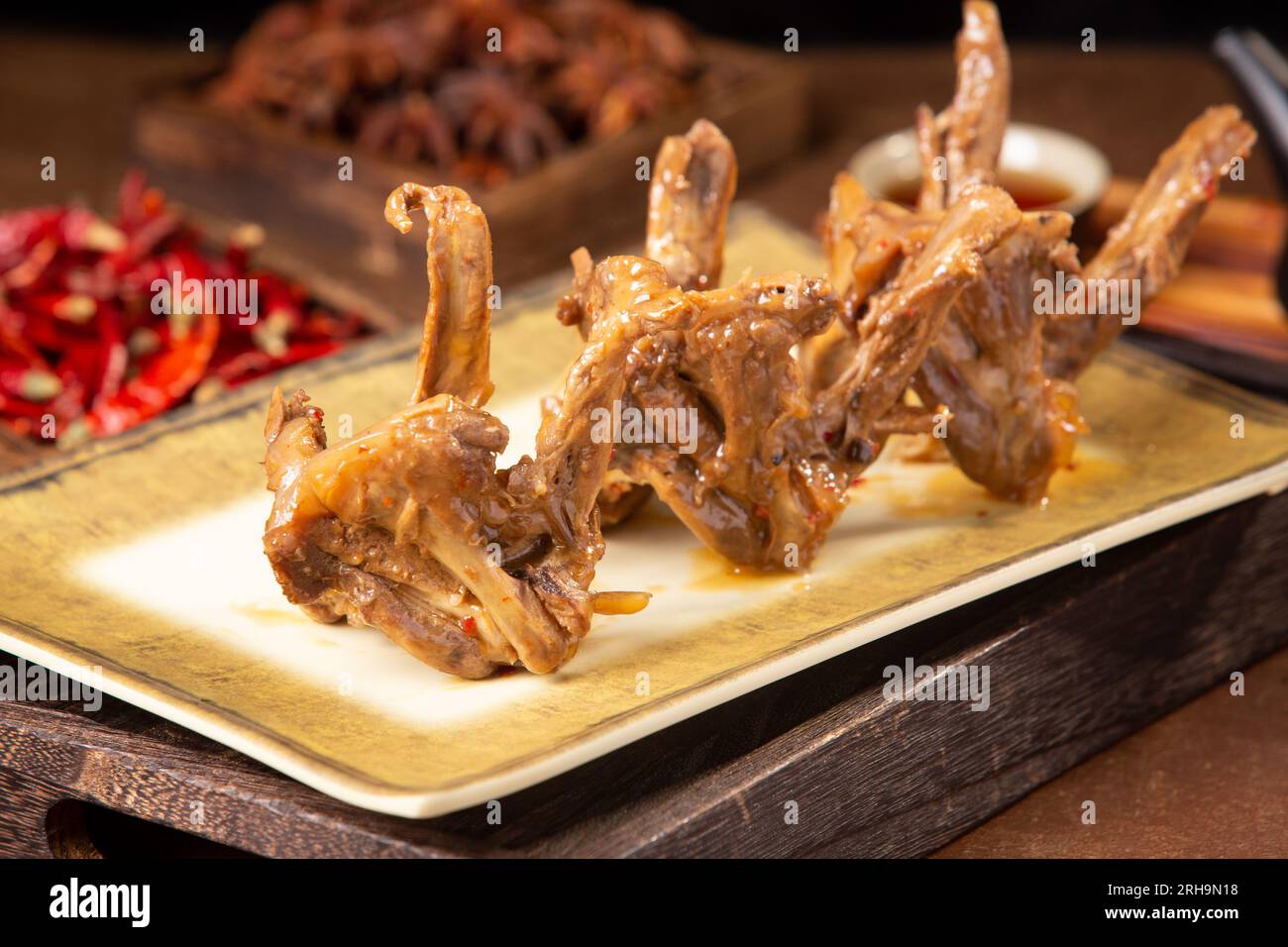 Marinated duck bone in Spiced Sauce Stock Photo Alamy