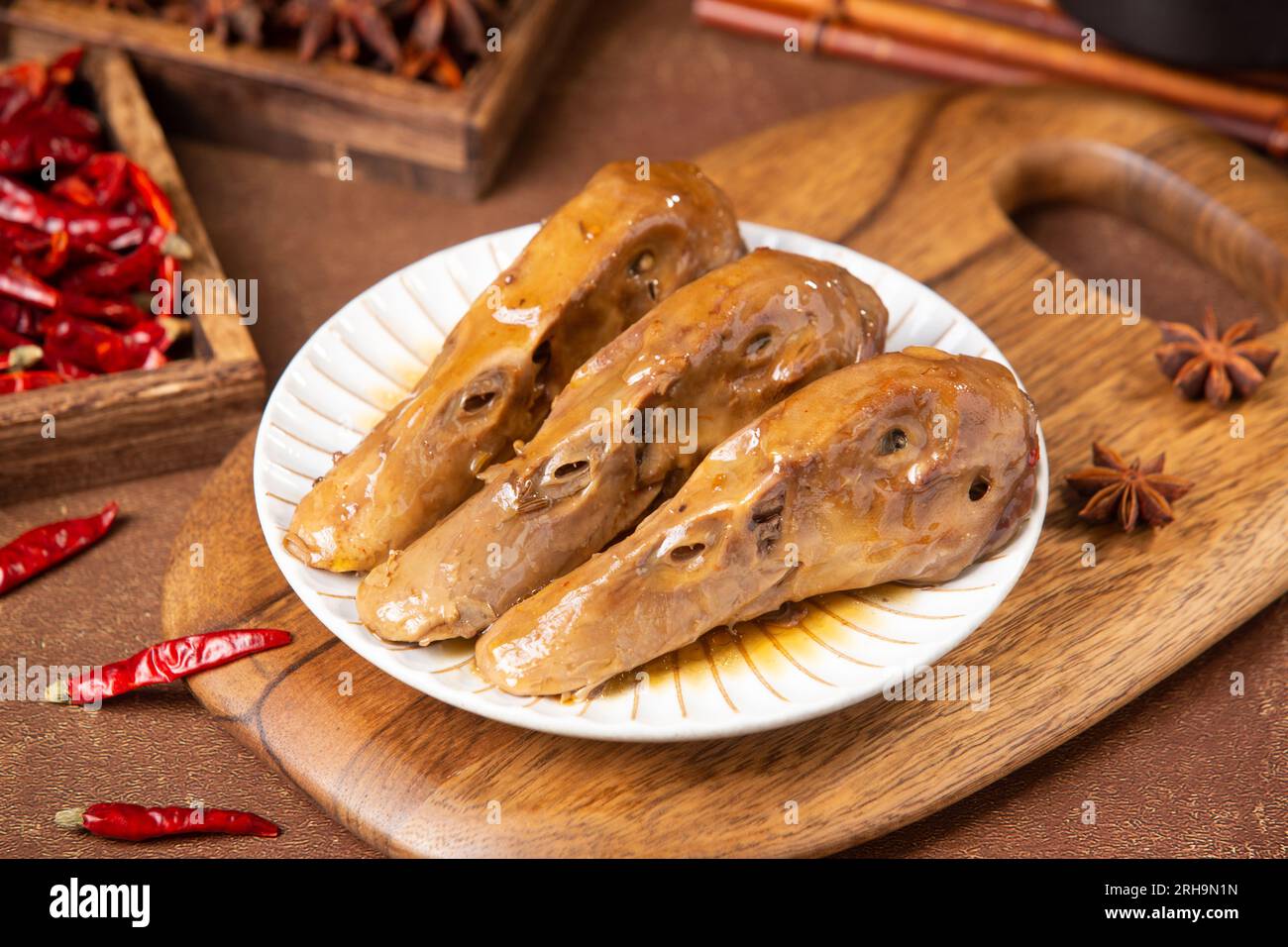 Marinated duck head in Spiced Sauce Stock Photo - Alamy