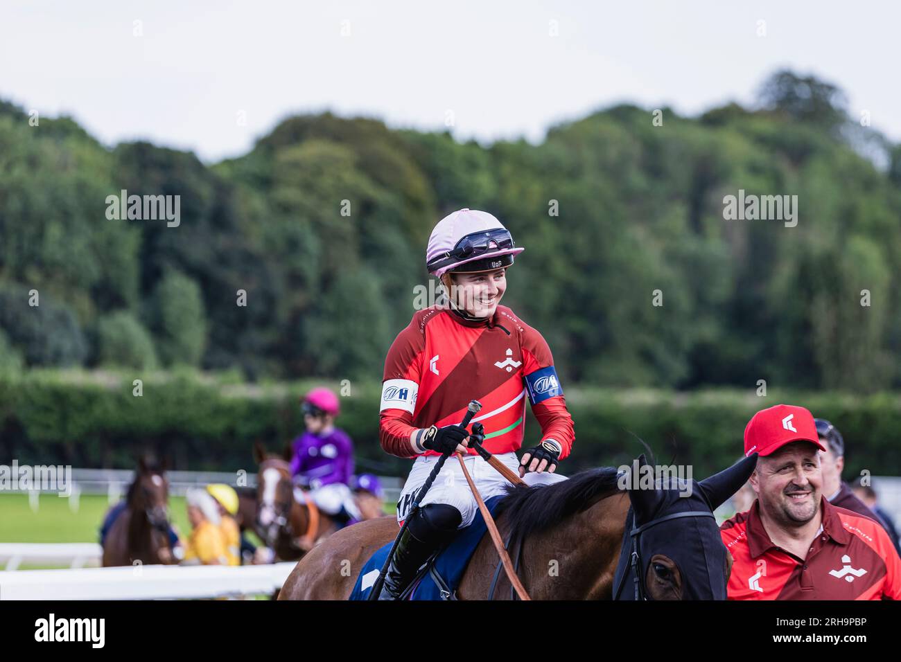 Female Jockey Saffie Osborne Smiling at Racing League Week 2 Meeting at