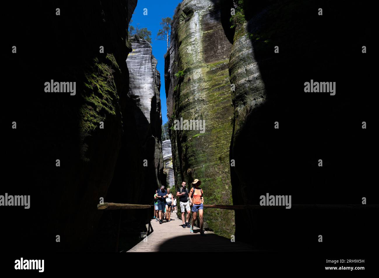 Tourists in Adrspach Rocks, Nachod region, Czech Republic, August 15, 2023. The rock gorges are usually more pleasant in the summer heat and the temperature difference is sometimes up to ten degrees Celsius. (CTK Photo/David Tanecek) Stock Photo