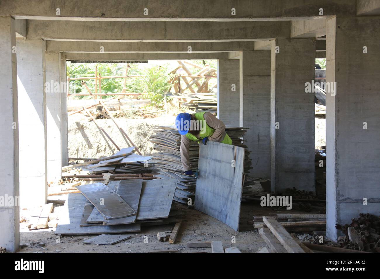 Kabul, Afghanistan. 13th Aug, 2023. An Afghan employee works at the construction site of a China-funded housing complex in Kabul, Afghanistan, Aug. 13, 2023. TO GO WITH 'Feature: Afghan staffer makes big stride in China-invested project' Credit: Saifurahman Safi/Xinhua/Alamy Live News Stock Photo