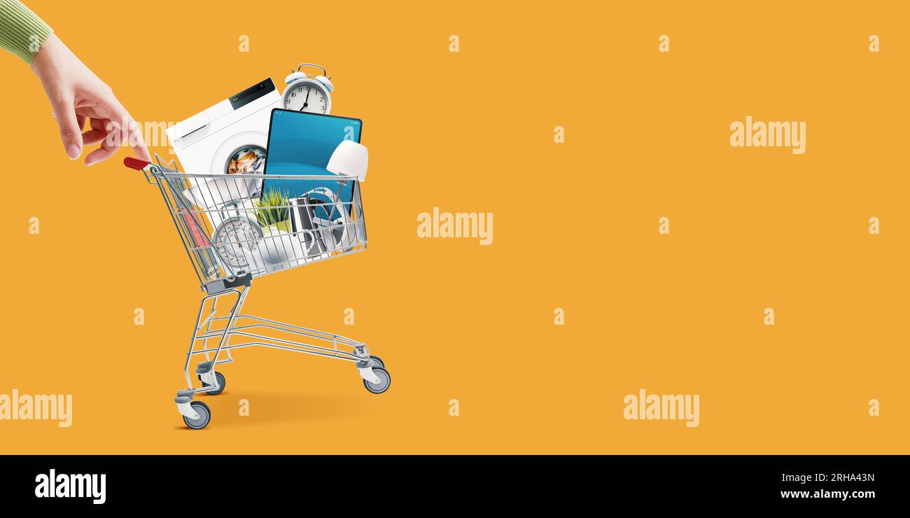 Woman pushing a small shopping cart full of household goods, appliances and electronics Stock Photo