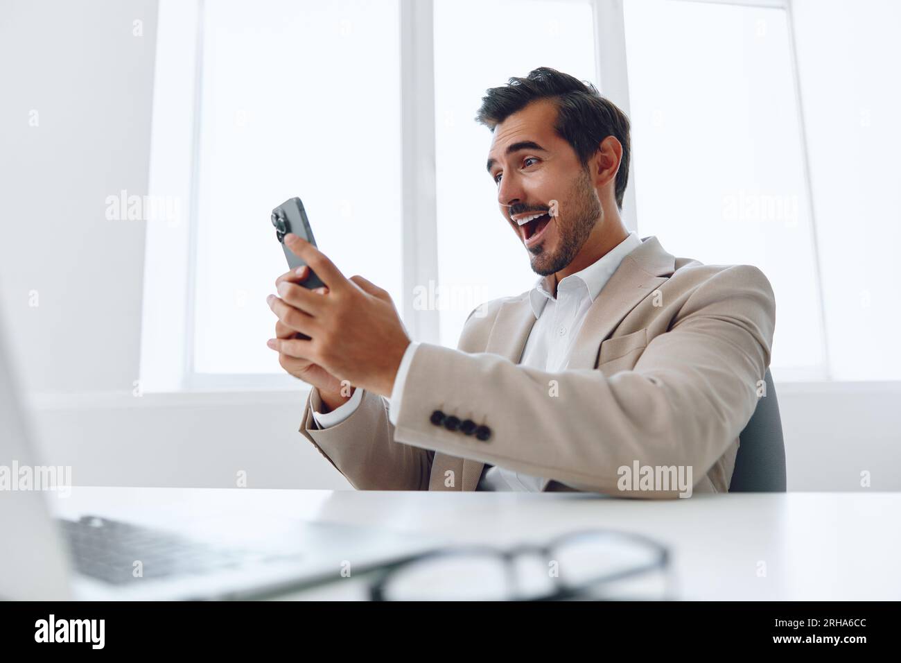 Man sitting handsome laptop computer wireless businessman phone smile ...