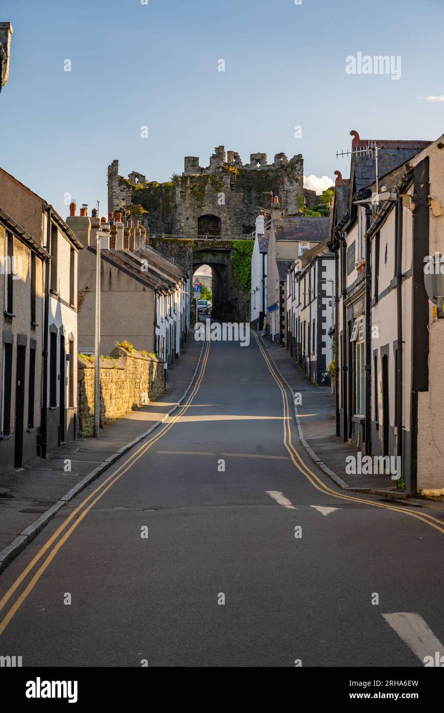 Looking up Upper Gate Street towards Upper Gate, Conwy North Wales Stock Photo