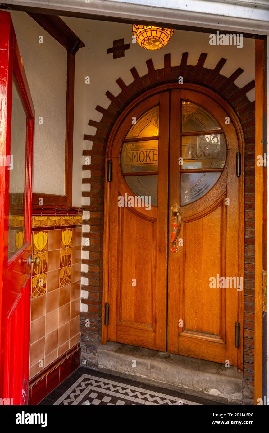 The Art Nouveau style door of the Albion Pub on Rose Hill Street Conwy North Wales Stock Photo