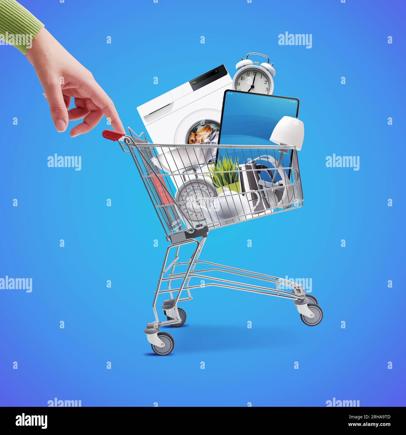 Woman pushing a small shopping cart full of household goods, appliances and electronics Stock Photo