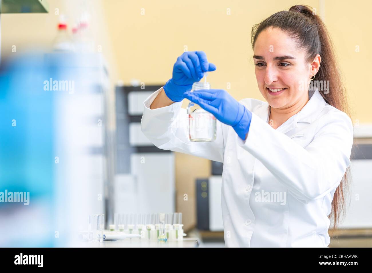 Chemical lab flask woman pharma hi-res stock photography and images - Alamy