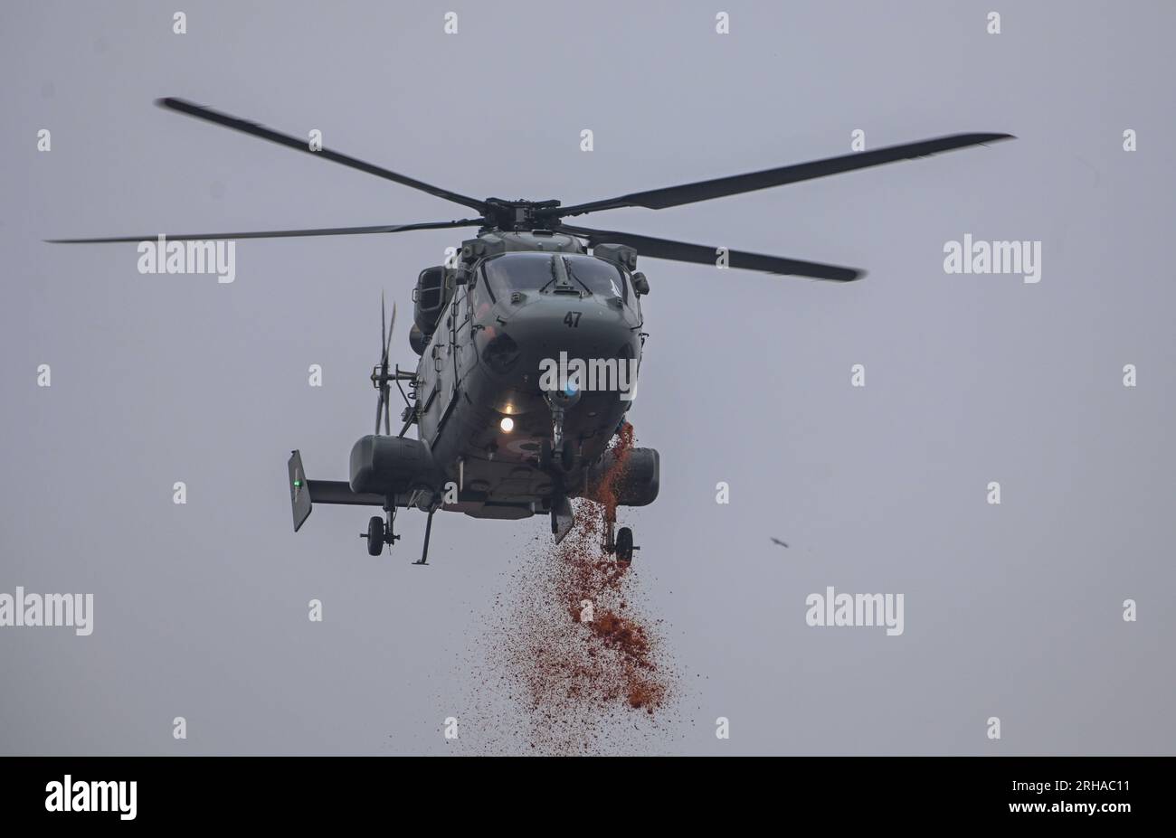 NEW DELHI, INDIA - AUGUST 15: Helicopters shower flower petals during 77th Independence Day function at the historic Red Fort on August 15, 2023 in New Delhi, India. Narendra Modi said that India helped different countries during the time of crisis and that India has emerged as a 'Vishwa Mitra' (friend of the world). He said the world is going to be influenced by technology and even developed countries are willing to learn about the success of Digital India. He said the government is working on a new scheme to push technology in the agriculture sector, under which thousands of self-help group' Stock Photo