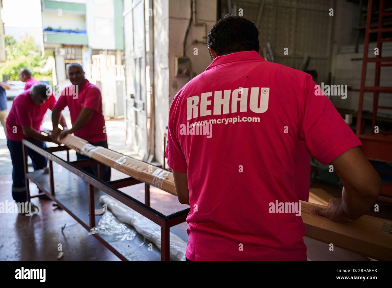 Workers packing cardboard box in warehouse for shipment. an operator ...