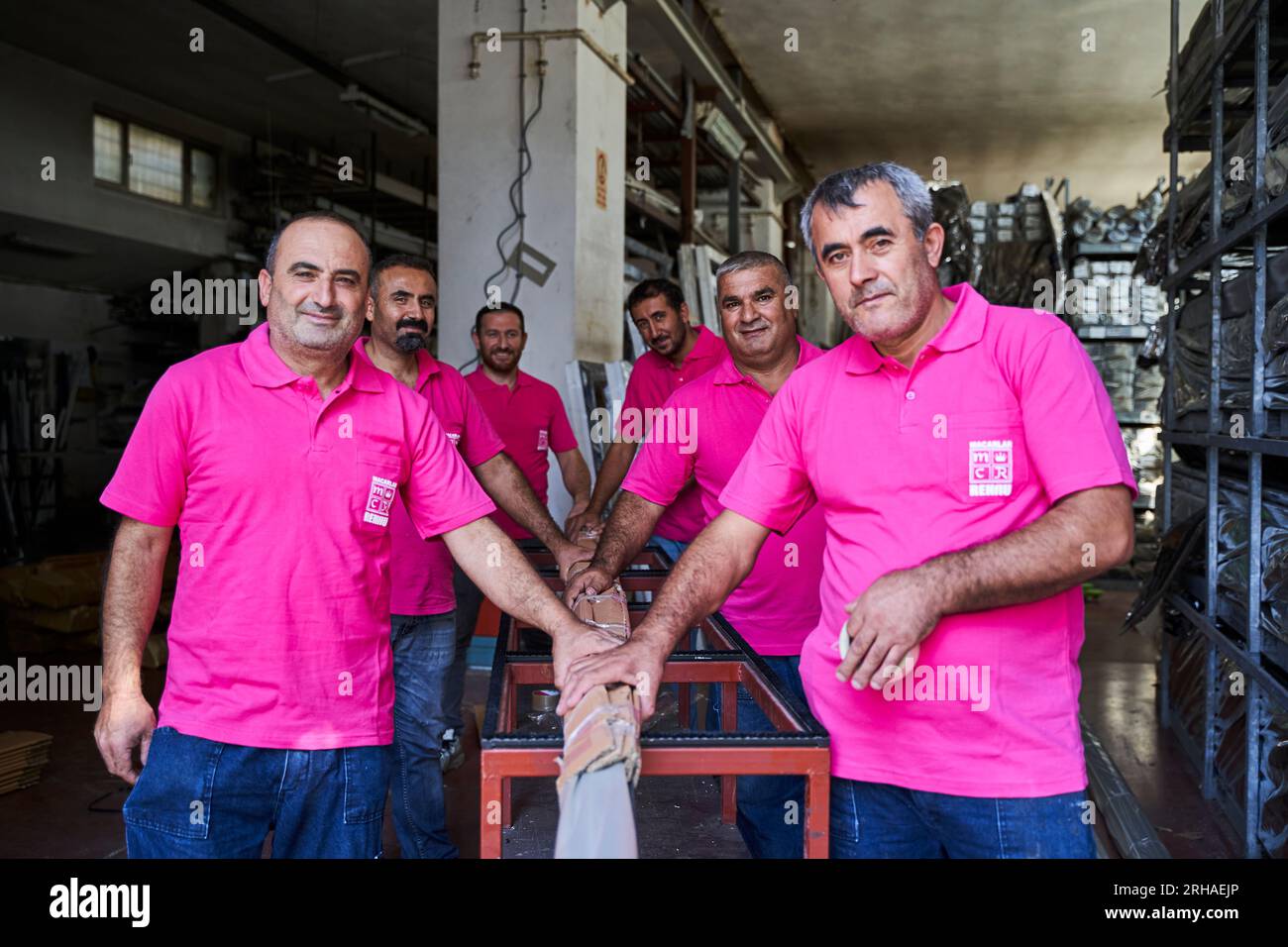 Workers packing cardboard box in warehouse for shipment. an operator ...