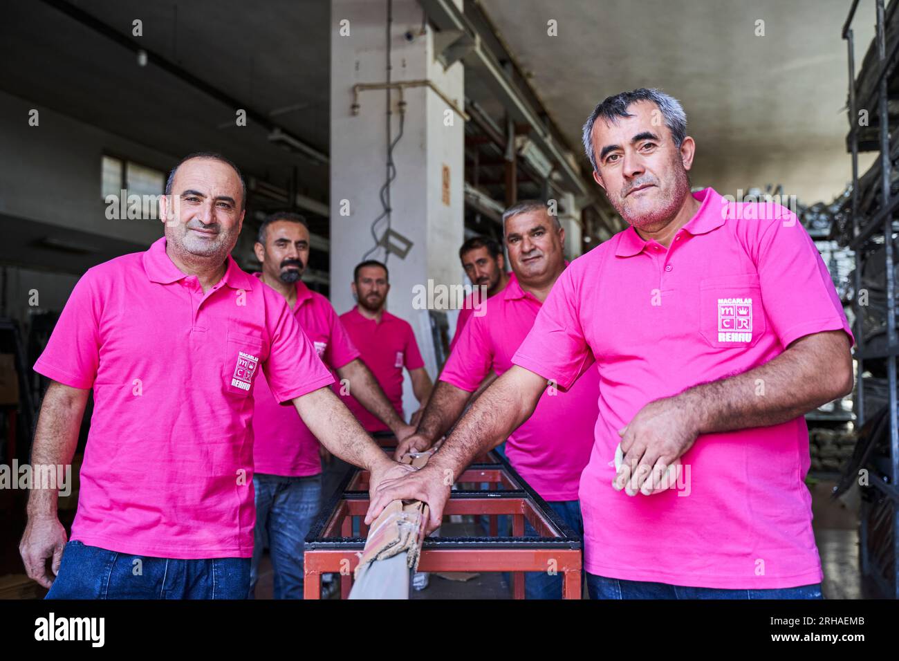 Workers packing cardboard box in warehouse for shipment. an operator ...