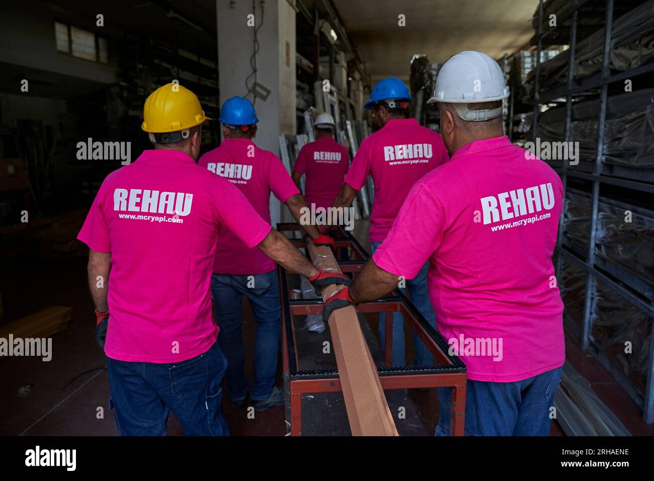 Workers packing cardboard box in warehouse for shipment. an operator ...