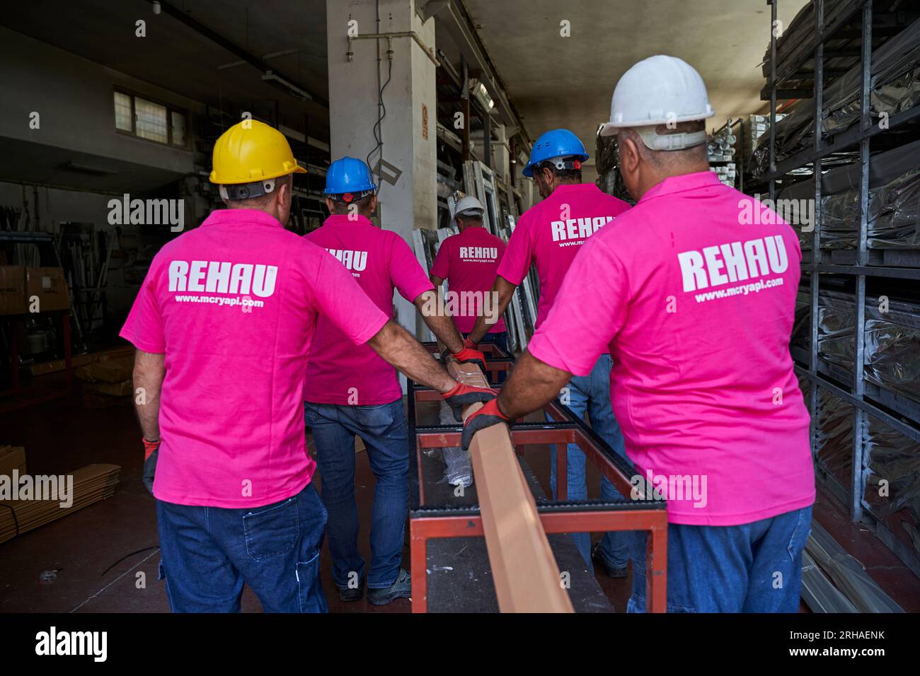 Workers packing cardboard box in warehouse for shipment. an operator ...