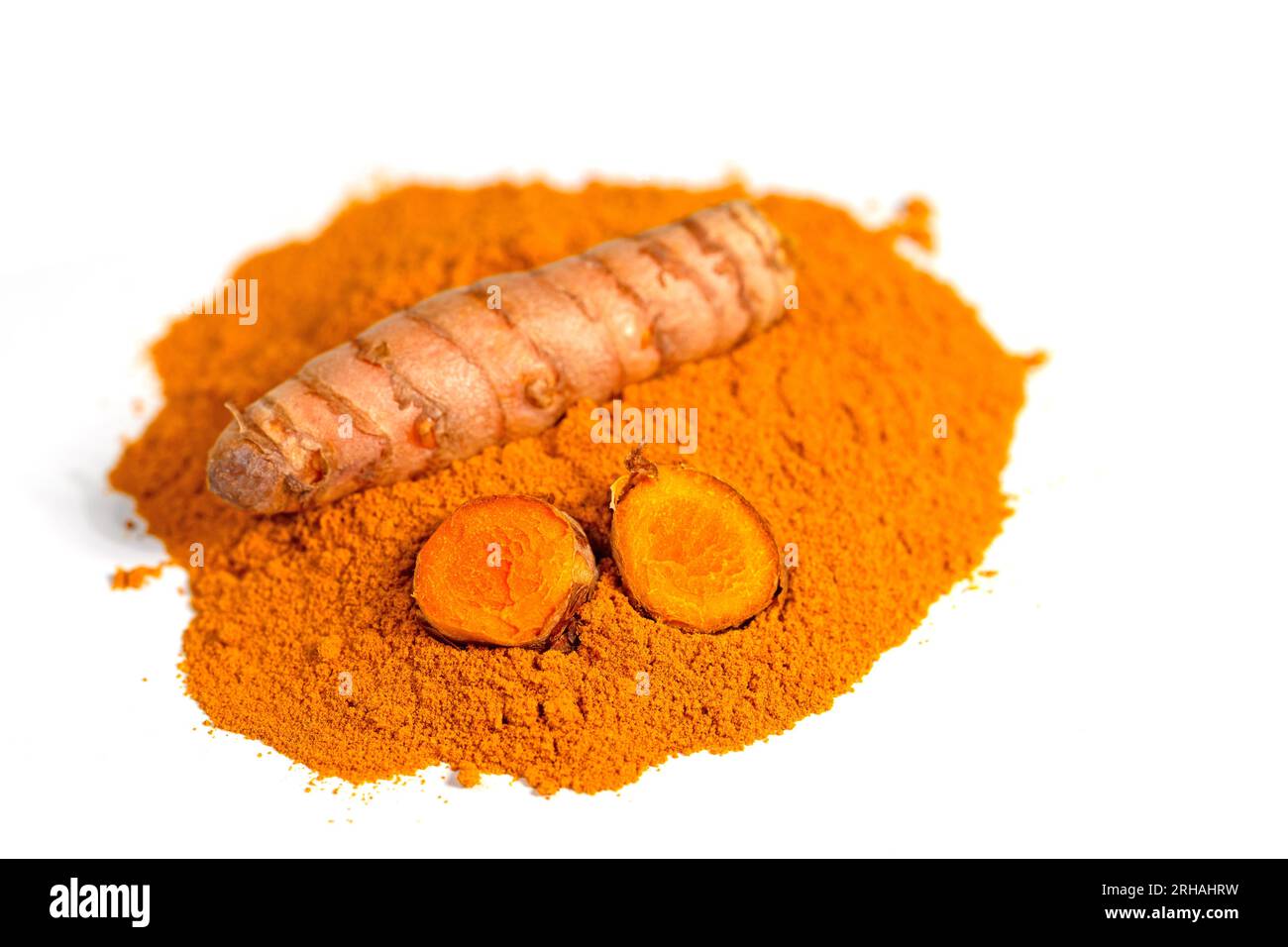 Ground turmeric root against white background Stock Photo Alamy