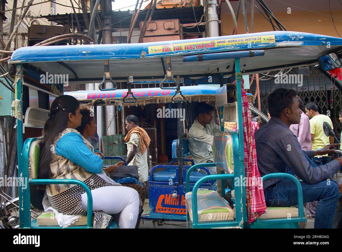 Varanasi Rickshaws India, Varanasi - March 21, 2018: Motor rickshaws and their passengers ...