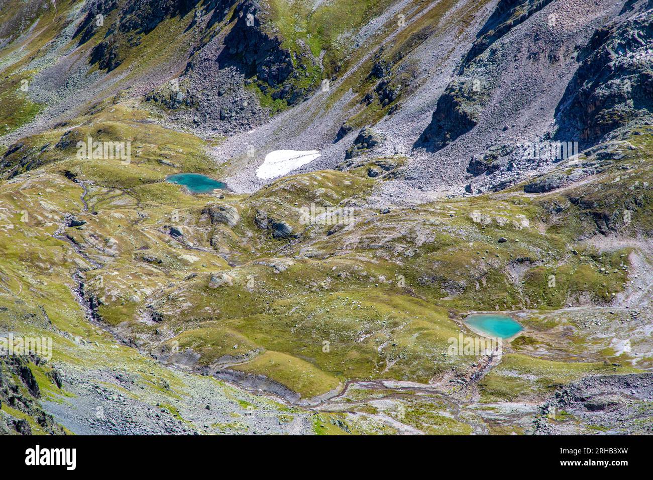 Stunning small blue lakes near the Schwarzhorn mountain in swiss alps, Switzerland Stock Photo