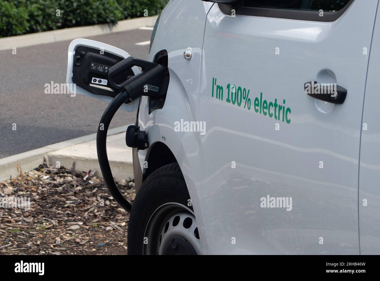 Slough, Berkshire, UK. 15th August, 2023. An openreach 100% electric vehicle on charge at electric vehicle rapid charging points next to the Greggs Drive Thru in Slough, Berkshire. Credit: Maureen McLean/Alamy Live News Stock Photo
