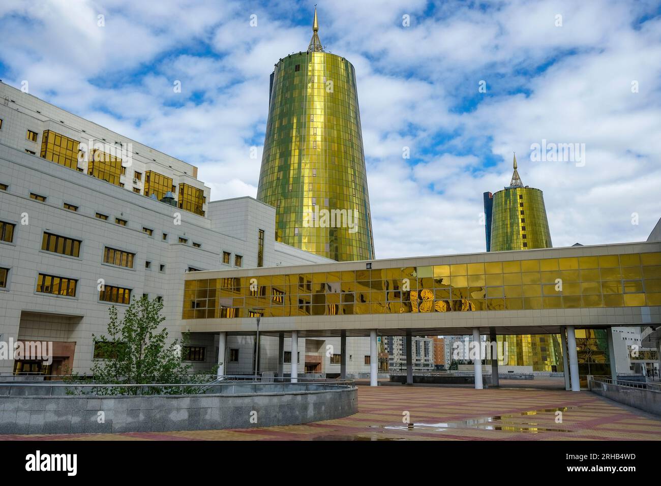 Astana, Kazakhstan - August 13, 2023: Views of the twin golden conical business centre in Astana, Kazakhstan. Stock Photo