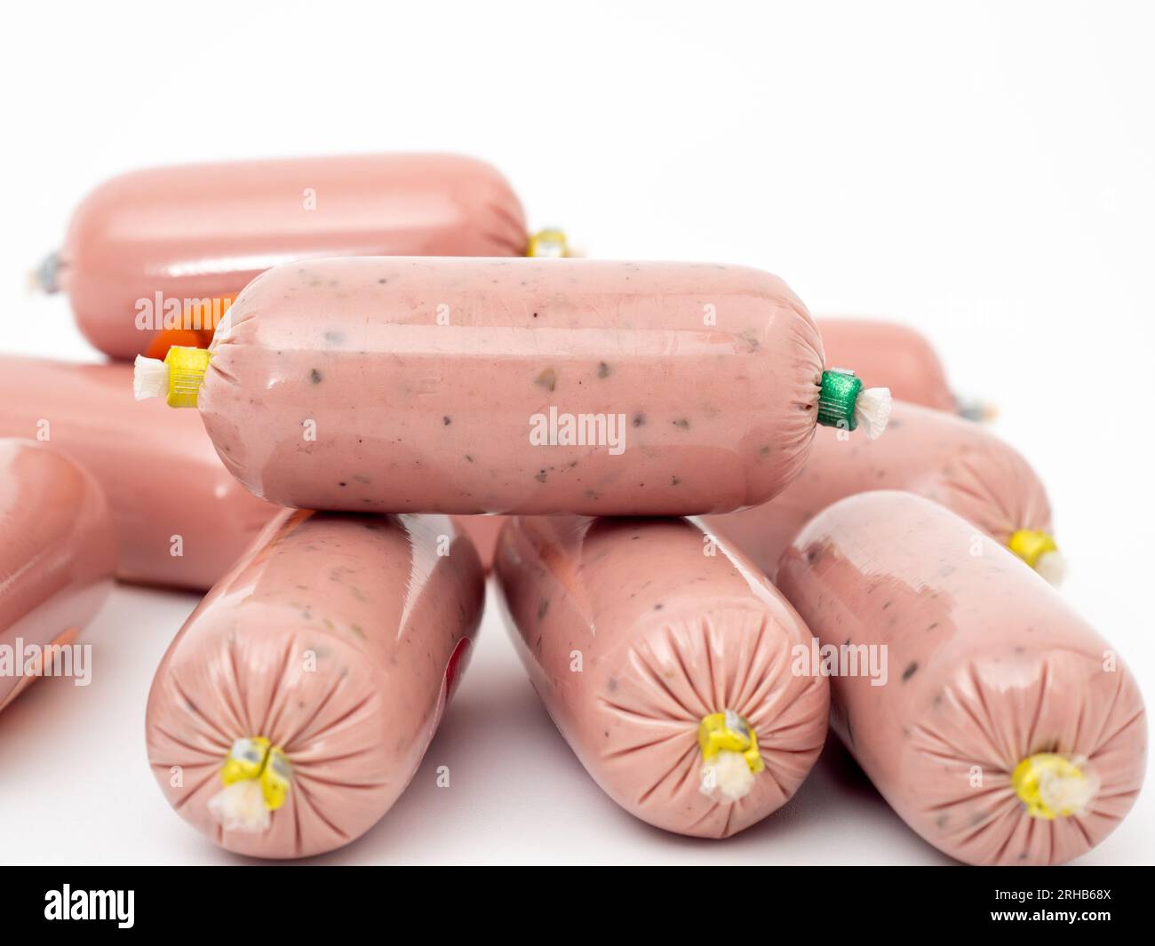 Small custard wrapper, crushed liver mousse, sachet of terrine, fish paste on white background