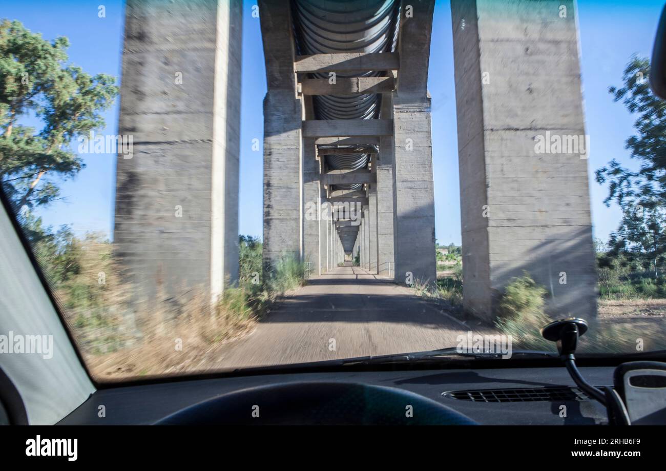 Driving under Acedera Aqueduct. Motion blurred shot Stock Photo