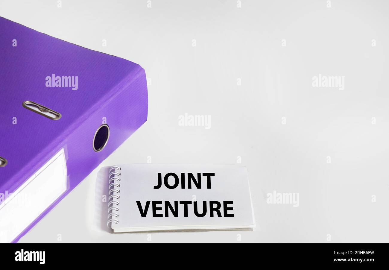 Handwriting text writing Joint Venture. Concept meaning Cooperation