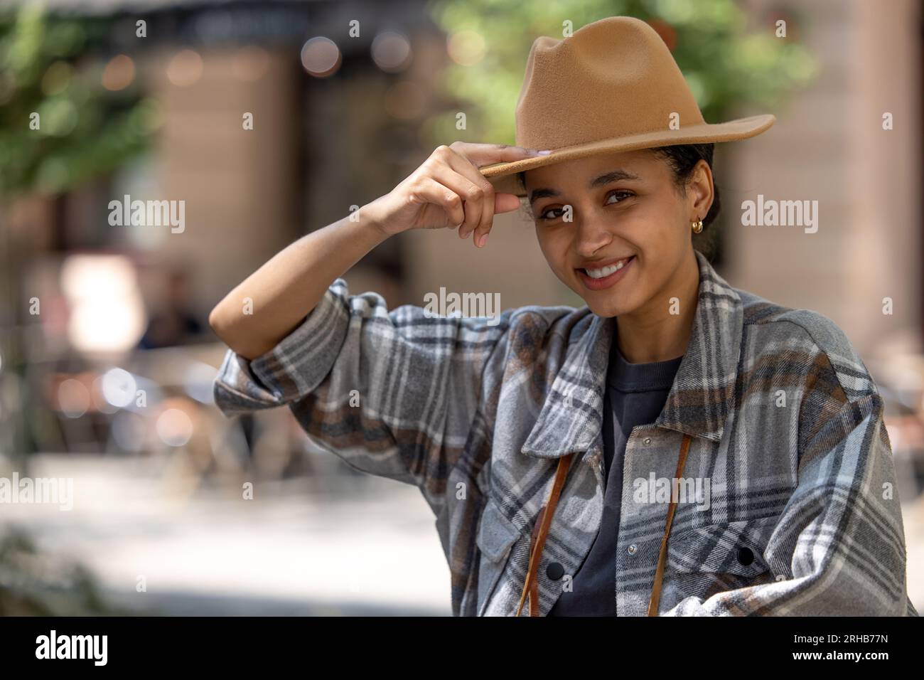 Pretty smiling girl in a straw hat Stock Photo - Alamy